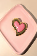 Liya Heartfelt pink earrings with delicate heart-shaped design, perfect for adding a touch of elegance to any outfit.