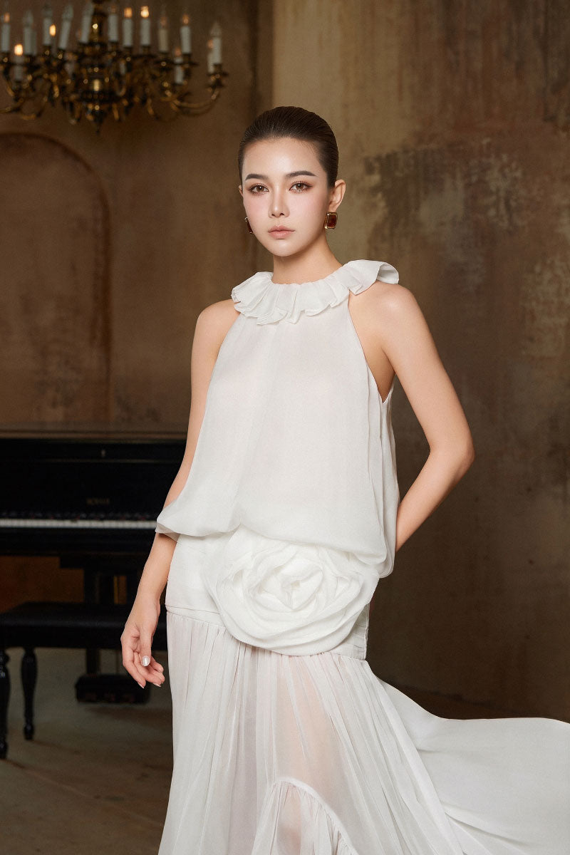 Arti Apparel Salus maxi dress featuring flowy fabric, sleeveless design, and elegant style perfect for summer or casual occasions.