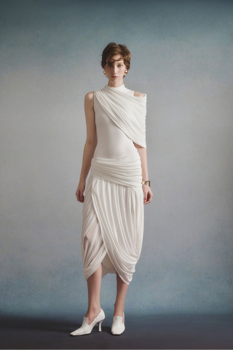 White Plan Lumière draped midi dress with flowing fabric and elegant design, shown on a model.