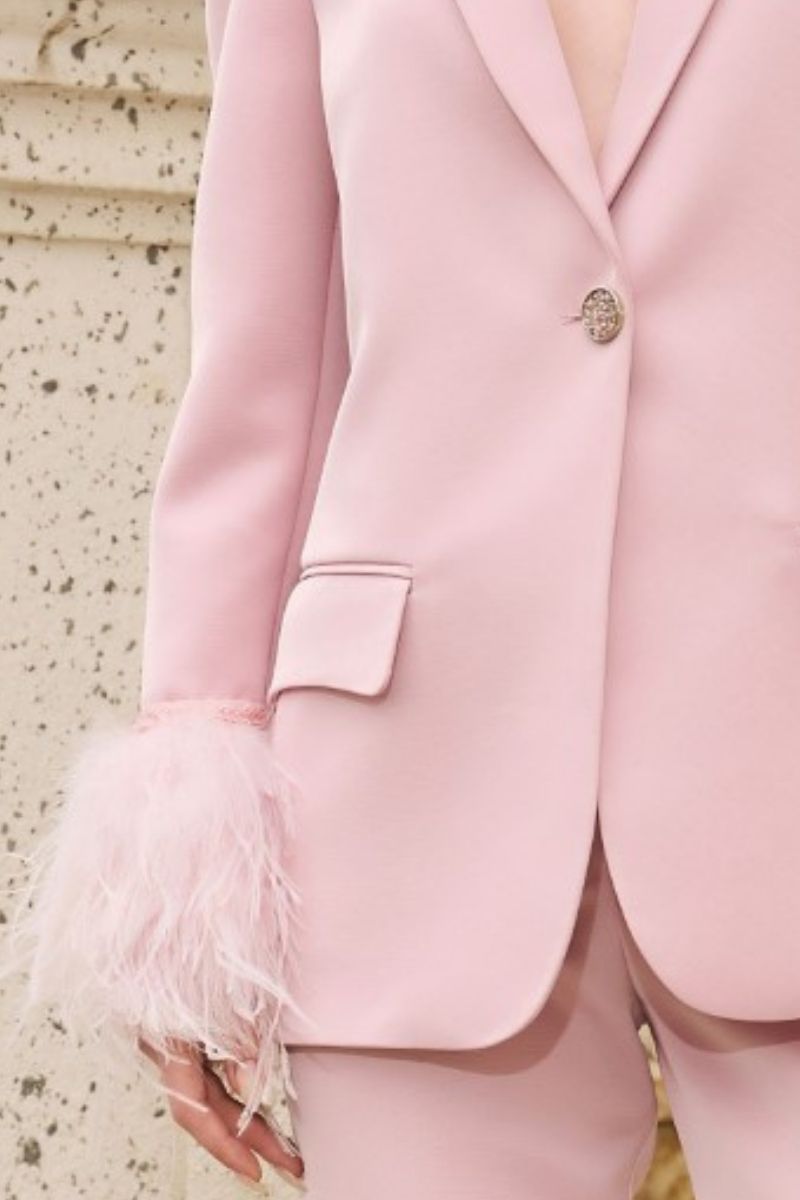 Baby pink Kelly taffeta feather suit co-ords set by 21Six featuring a jacket and matching pants, styled for a charming look.