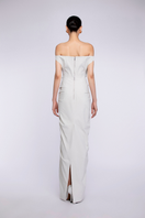 Ivory maxi dress by TONYY with flowy fabric and sleeveless design, perfect for elegant summer occasions.