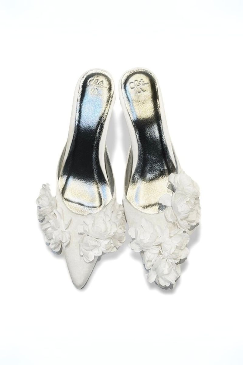 Christin Wu Camelia Cream Bloom Heels showing beige floral-patterned shoes with ankle straps and elegant design.