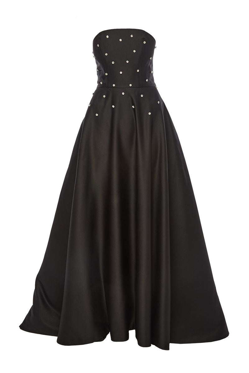 Black BAÉ Eve Diamonds gown with elegant design, featuring flowing fabric and intricate details suitable for formal occasions.
