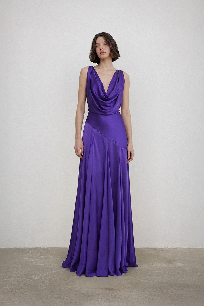 Elegant MILAN DRESS gown by Deme By Gabriella, featuring flowing fabric and intricate design details.