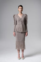 Gray Liya midi skirt with fringe detailing, showcasing the flowing fabric and stylish design.