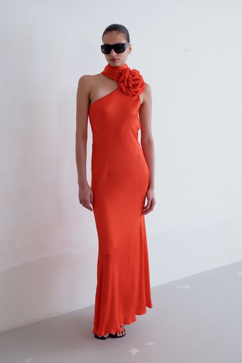 Sisters Marilyn maxi dress in scarlet red with a flowing silhouette, perfect for elegant occasions and summer wear.
