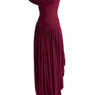 Deme By Gabriella Cassidy maxi dress in aubergine, flowing fabric and elegant design, shown on a model.