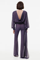 Purple Kris Marán blouse with ties and a back collar, featuring a stylish and elegant design, shown on a model.