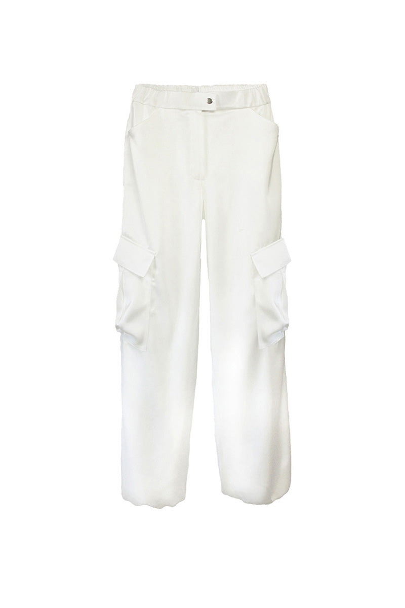 White silky cargo pants by KRIS MARÁN featuring a relaxed fit, multiple pockets, and a smooth, shiny fabric.