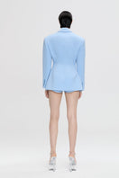 Nué Delphine blazer in classic tailored style, featuring a structured fit and neutral color, perfect for sophisticated office wear.