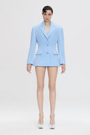 Nué Delphine blazer in tailored fabric, featuring classic lapels and a fitted silhouette, displayed on a neutral background.