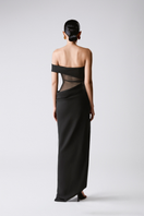 Black NIGHT BLOOM MAXI DRESS by TONYY, flowing fabric with floral pattern, full-length dress with elegant neckline.