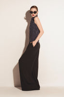 Black Valenciani wide leg trousers, stylish and comfortable pants with a relaxed fit, shown on a model.