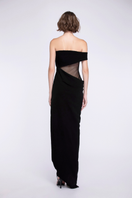 Elegant NIGHT BLOOM TONYY maxi dress with floral pattern, flowing fabric, and sleeveless design perfect for summer occasions.