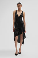 Black Maccapani Katie midi dress with a fitted waist and elegant silhouette, shown on a model.