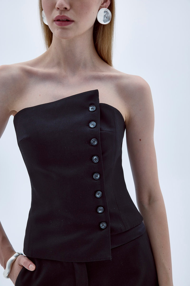 Black ODYLE top by Nazlı Ceren, shown on a model, featuring a stylish and fitted design in a versatile blouse style.