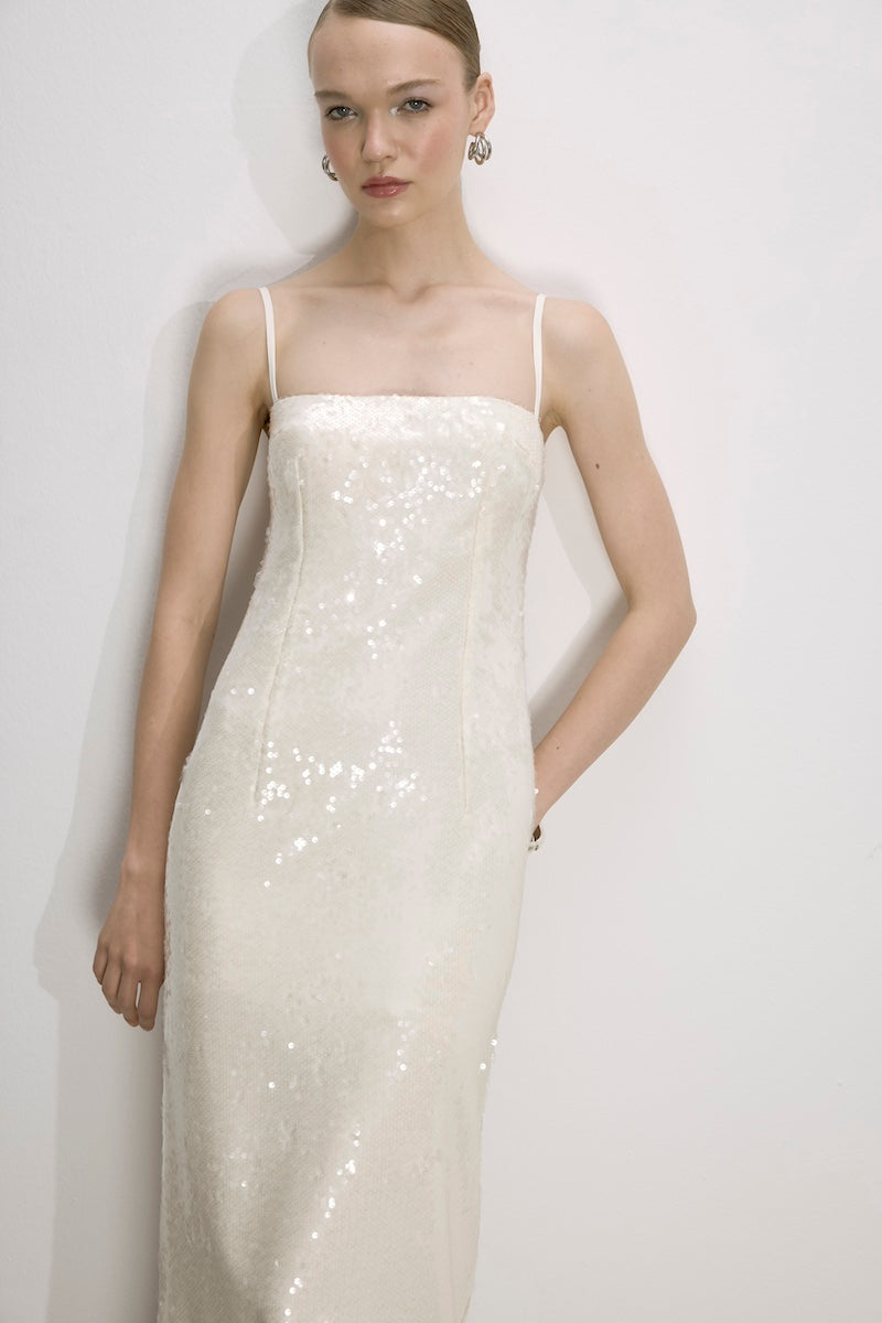 Nazlı Ceren Miles Sequin Dress in Cloud Cream, a midi dress with shimmering sequins and elegant design, displayed on a model.