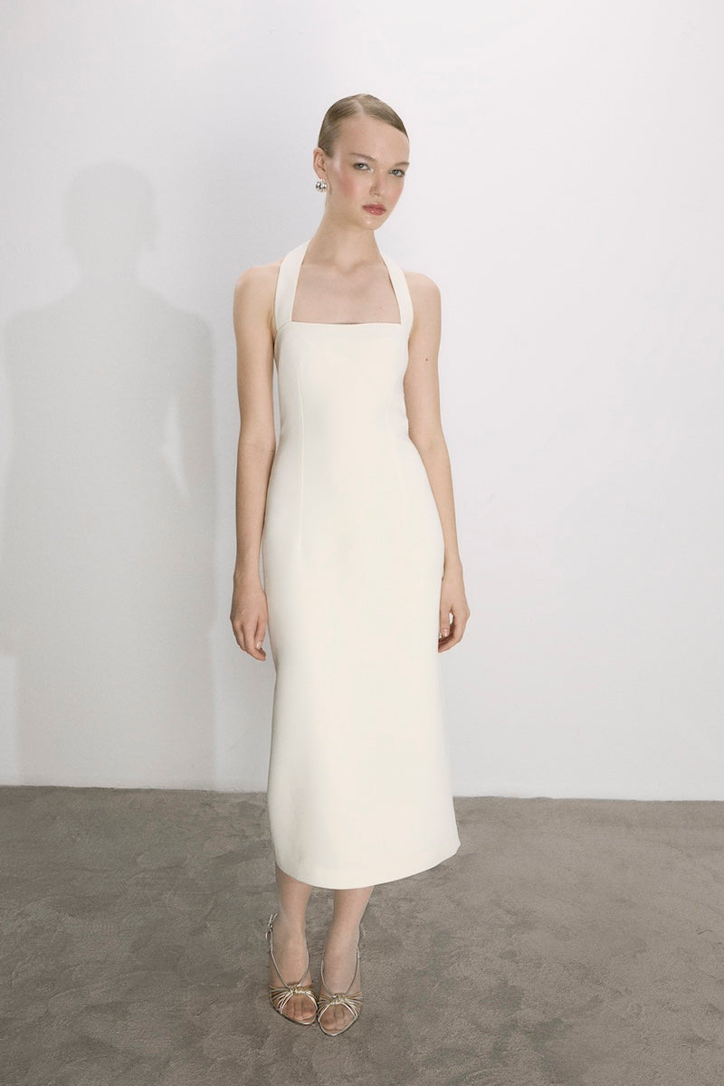 Nazlı Ceren Margaux crepe midi dress in vanilla ice, featuring a sleek, elegant design with a fitted waist and flowing skirt.