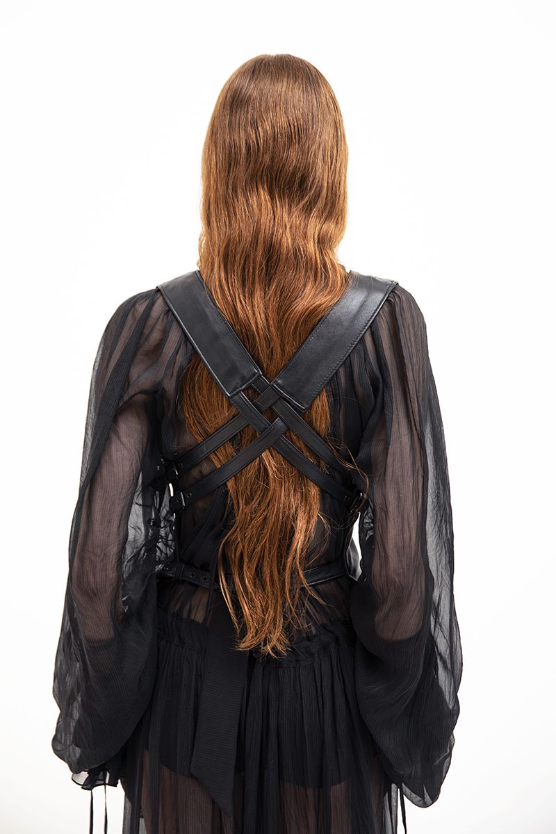 Black leather vest with belt, Vaska jacket featuring a stylish fit and smooth leather texture, shown on a plain background.