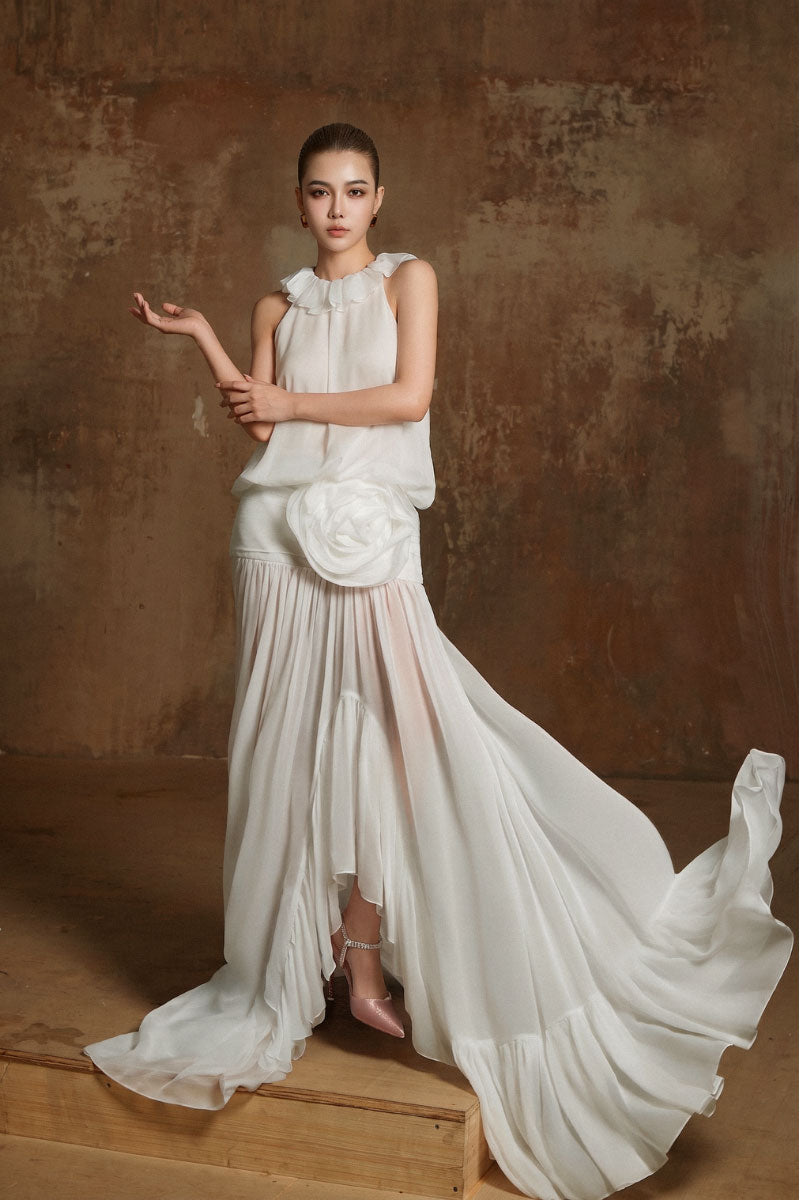 Arti Apparel Salus maxi dress in flowing fabric, stylish design, and vibrant color, perfect for casual or summer wear.