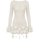 Keira Tong sculpted rose mini dress featuring a fitted design and floral pattern, displayed on a mannequin.