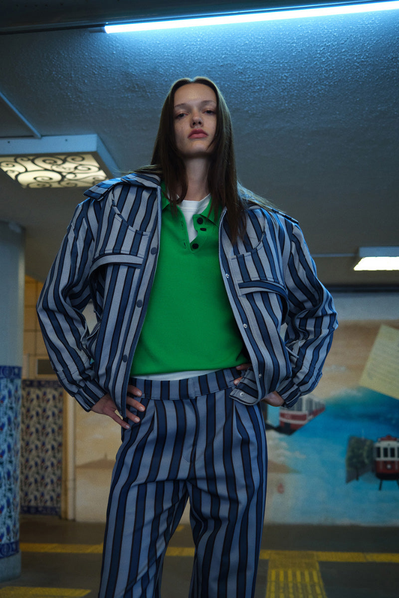 Blue striped pants by ColoReve featuring a relaxed fit and stylish pattern, shown on a model.