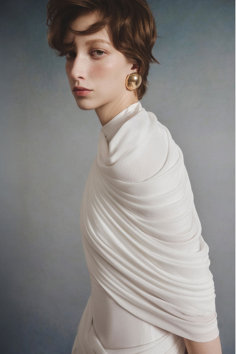 White Plan Lumière draped midi dress with elegant flowing fabric and a stylish silhouette, perfect for formal occasions.