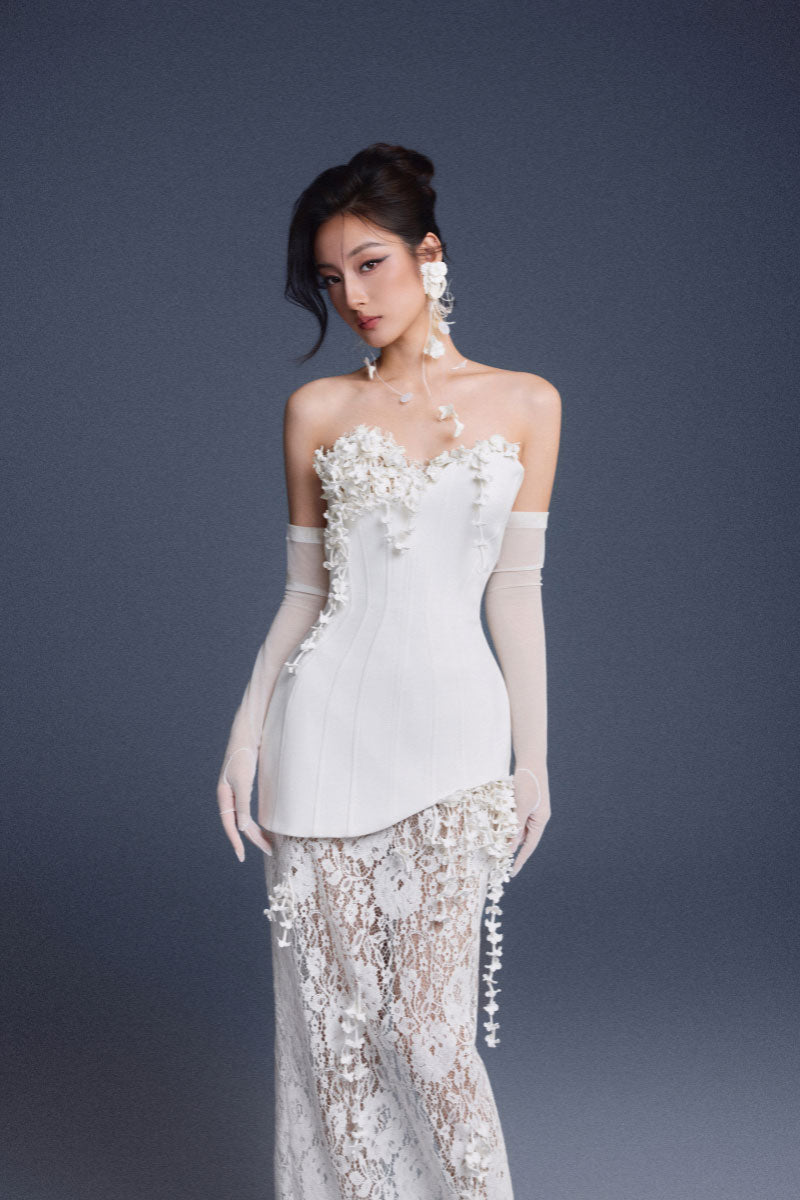 Keira Tong bouquet lace corset gown showing intricate lace details and fitted silhouette for elegant evening wear.