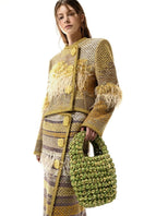 Lalo Avril gold jacket with sleek design, showcasing shiny metallic fabric and modern style on a plain background.