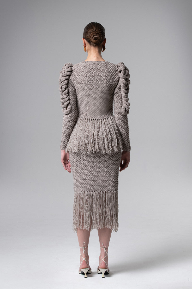 Gray Liya midi skirt with fringe details, stylish and flowing, perfect for casual or dressy occasions.