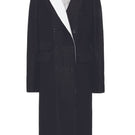 Vaska black double-breasted coat with white collar, stylish and tailored outerwear for a sophisticated look.