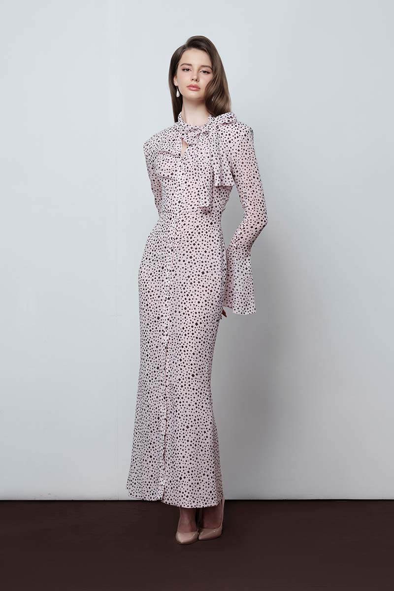 Do Long pixelated love maxi dress featuring a colorful, abstract pattern and flowing fabric, perfect for casual or stylish occasions.