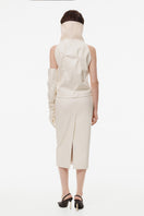 Off-white ruched top with a high collar by KRIS MARÁN, showcasing a fitted design and stylish neckline.