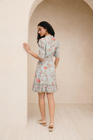 Raishma Everly blue mini dress with fitted silhouette and short sleeves, perfect for stylish occasions.