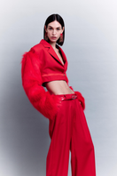 Sudi Etuz low waist straight cut pants featuring a classic fit and neutral color, displayed on a plain background.