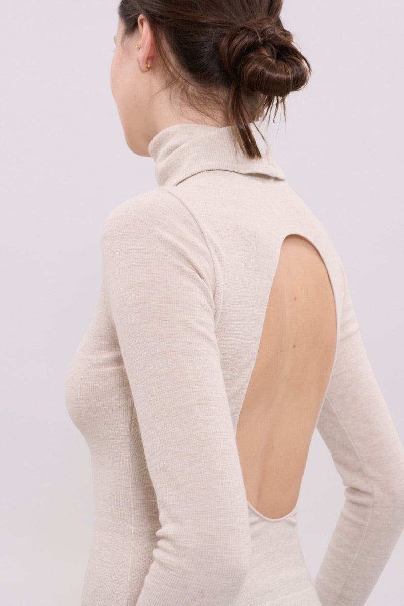 Cream long sleeve top by La Granni, close-up of the soft fabric and fitted style, perfect for casual or layered outfits.