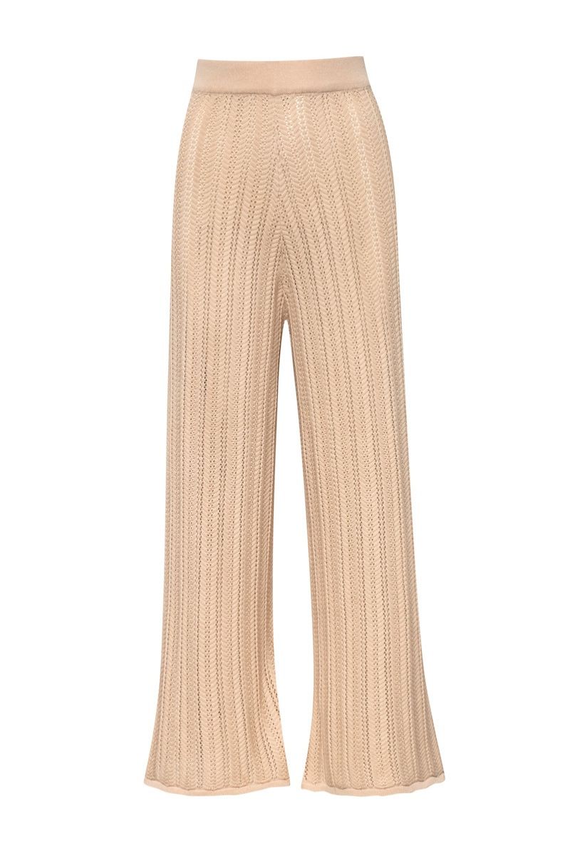 Baobab Corsica Pants showing relaxed fit, lightweight fabric, and stylish design in neutral color.