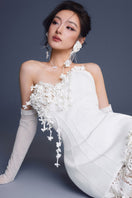 Keira Tong bouquet corset lace gown featuring intricate lace details and a fitted silhouette, ideal for elegant occasions.