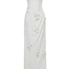 White Plan OVIEN maxi dress featuring a flowing fabric, sleeveless design, and elegant silhouette perfect for summer wear.