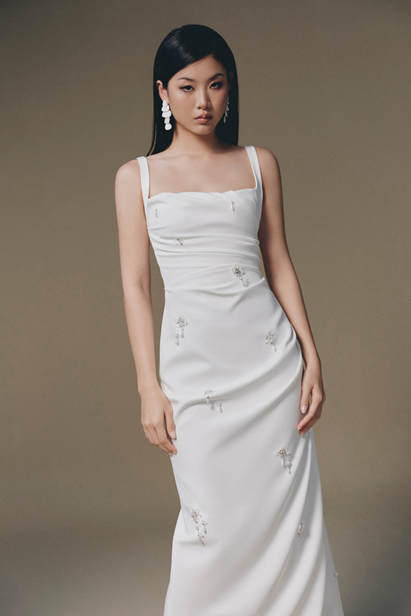 Keira Tong Ripple Maxi Dress featuring a flowing, layered design with a subtle wave pattern, perfect for elegant summer wear.