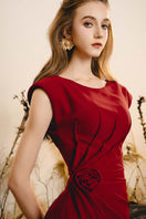 Elegant Do Long delicate midi dress with soft fabric and intricate details, perfect for stylish occasions.
