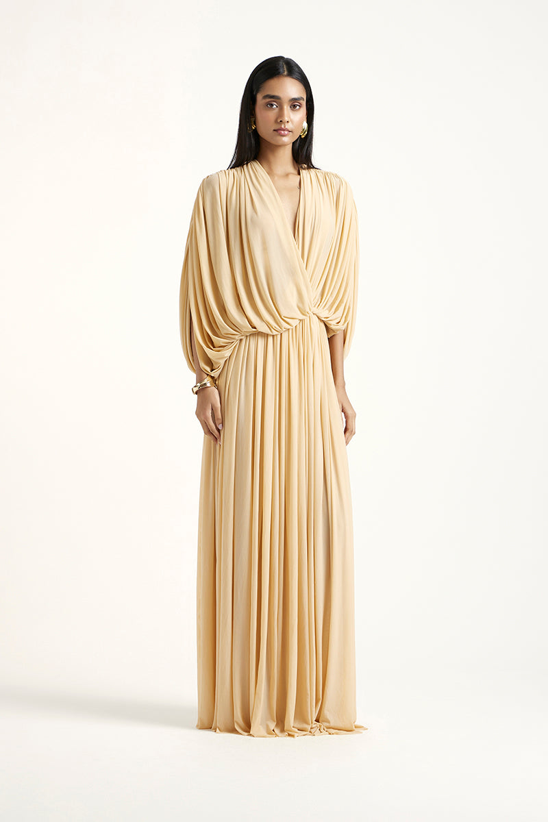 Deme By Gabriella RORI gold maxi dress with elegant flowing fabric and stylish design, perfect for formal occasions.