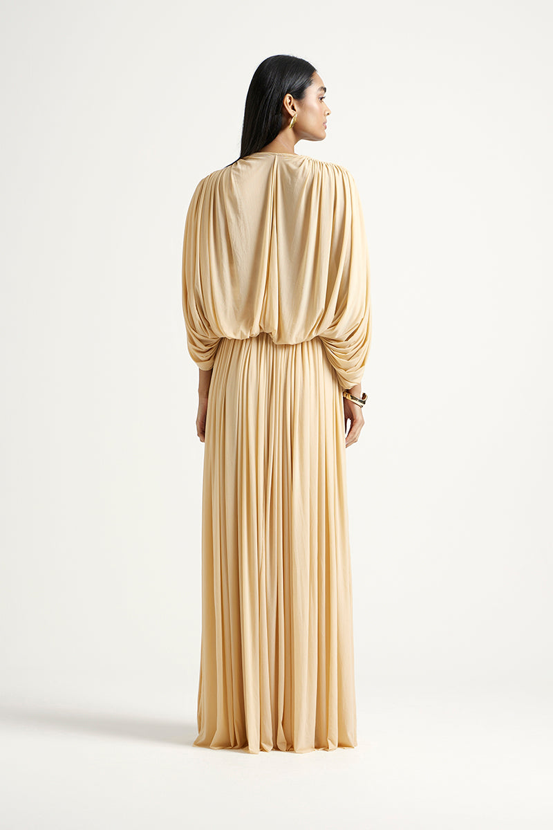 Gold RORI maxi dress by Deme By Gabriella, featuring elegant fabric and stylish design, perfect for formal occasions.