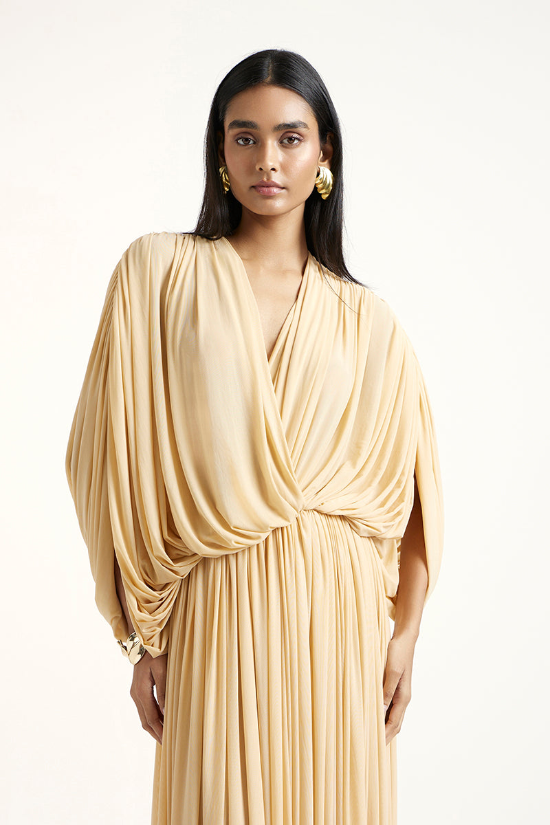 Deme By Gabriella RORI gold maxi dress with elegant flowing fabric and intricate detailing, perfect for formal occasions.