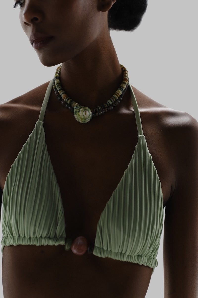 Baobab Kaia bikini top in jade green, featuring a stylish design and adjustable straps, perfect for beach or poolside wear.