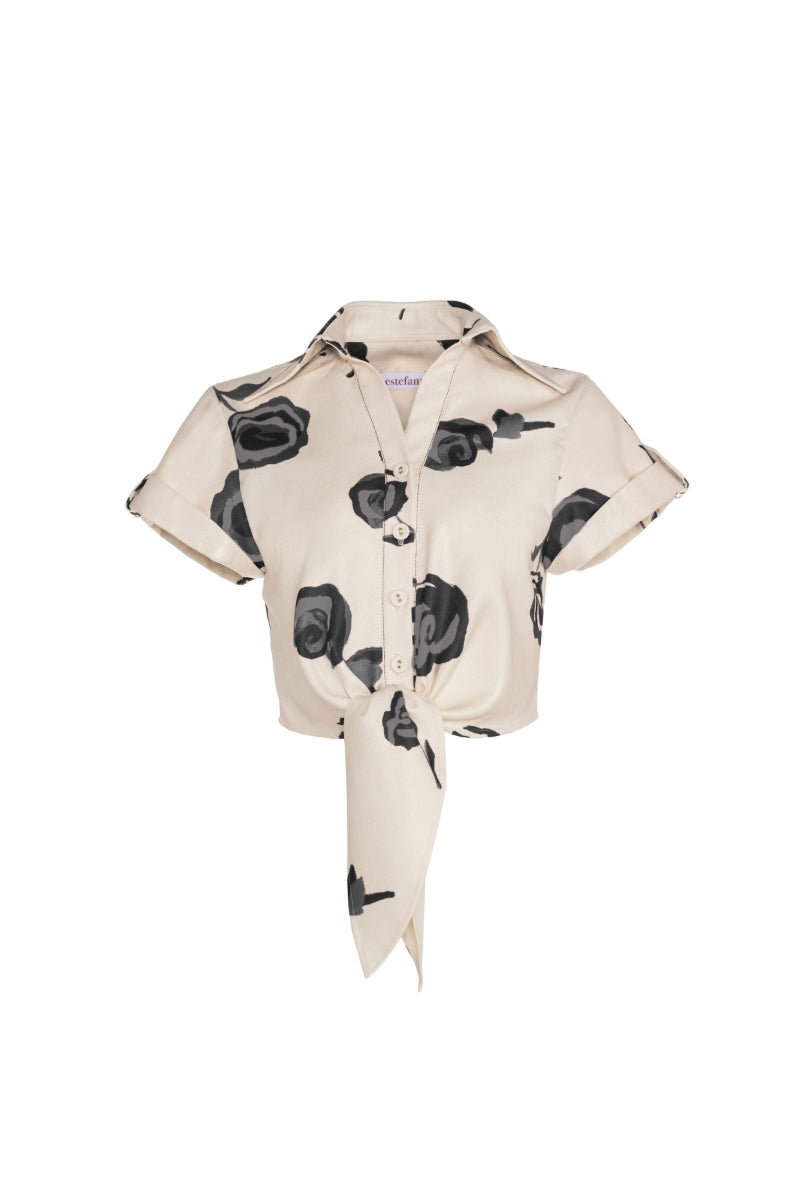 Black Rosseta blouse by Estefania, stylish women's top with a flattering fit, shown on a mannequin.