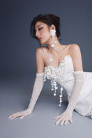 Keira Tong bouquet corset lace gown featuring intricate lace details and a fitted silhouette, perfect for elegant occasions.