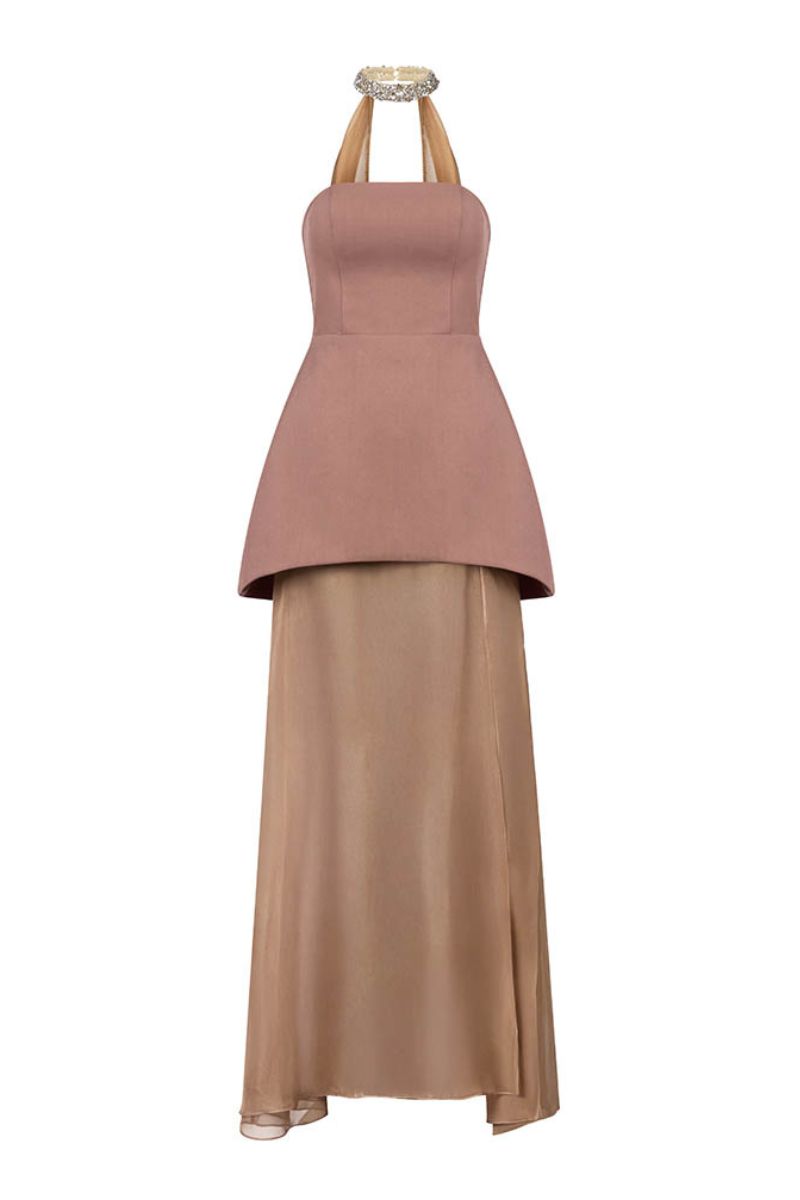 Brown strapless gown with a flowing cape by HACCHIC COUTURE, shown on a model with elegant styling.