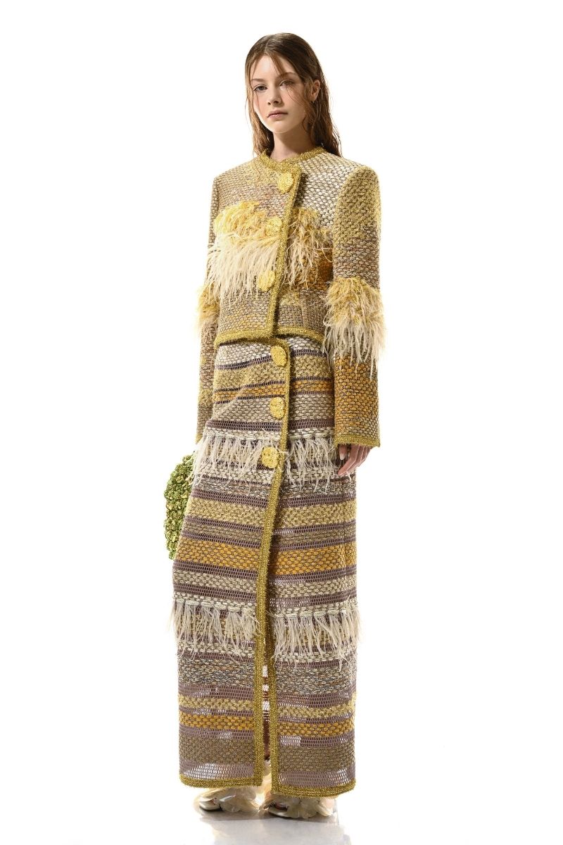 Lalo Avril gold jacket with stylish design, featuring a metallic finish and fitted silhouette, displayed on a mannequin.