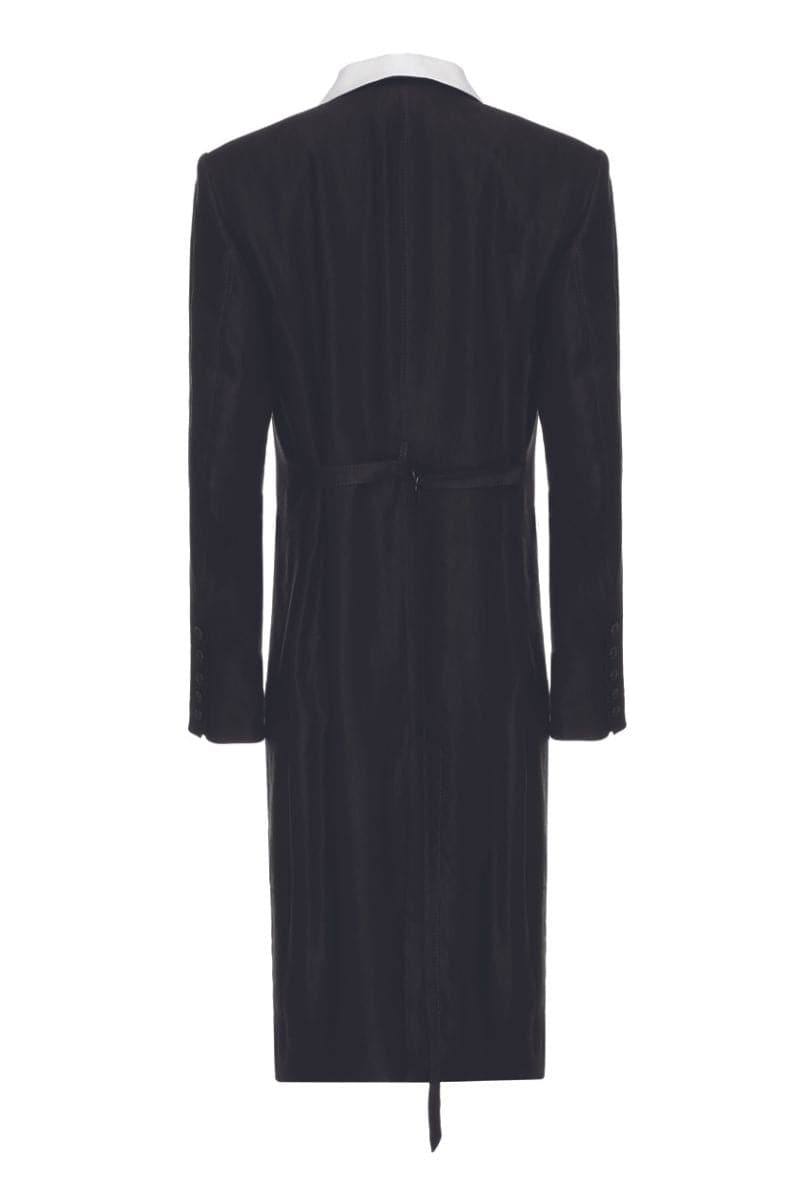Vaska black double-breasted white collar coat displayed on a hanger, showcasing classic design and tailored fit.